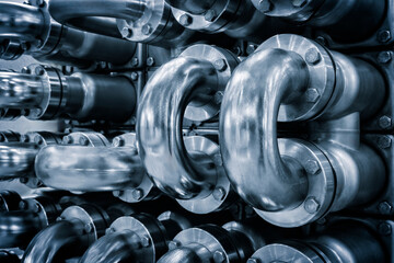 Poster - Metal blue curved pipes as an industrial concept background for a web page, template or web banner