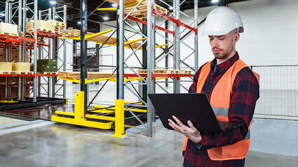 Poster - Warehouse worker. Man storekeeper in storage area. Storehouse employee uses laptop. Factory warehouse manager. Man storekeeper in orange vest. Builder is designing modern warehouse.