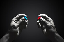 Choice Concept With Red And Blue Pills In Hands, Decision Making Symbol
