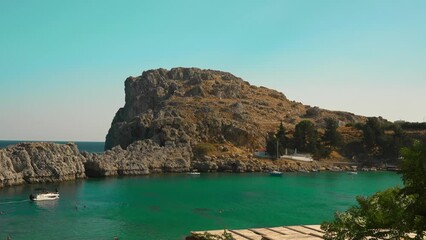 Sticker - High cliffs in St. Paul's Bay in Rhodes in Greece.