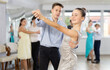 © JackF - Couple boy and girl rehearsing waltz dance in studio