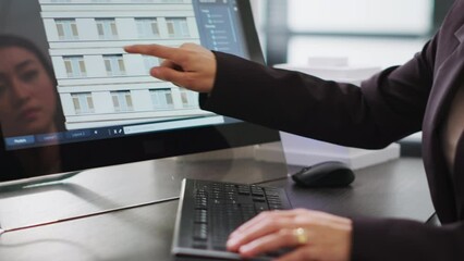 Poster - Skilled designer using 3D modeling tools to develop designs for buildings, create architectural plans at desk. Woman performing engineering task with CAD software app in a startup office.
