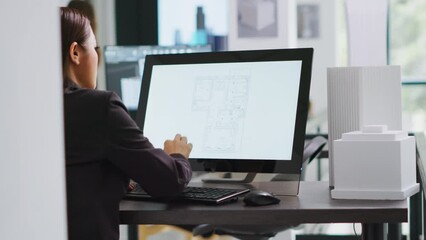 Poster - Technician operating on cad software to create blueprint for new architectural scaling project, using industrial elements in coworking space. Developer designing creative sketch. Handheld shot.