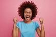 Photo of ecstatic lady shout loud yeah fist up raise win lottery isolated on color background 