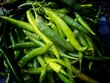 © Nattapong - Many green chilies sold in the Thai market