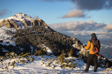 Wall Mural - Hiker in a wintry mountain landscape