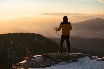 Canvas Print - Hiker in a wintry mountain landscape