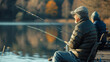 elderly man sitting by a calm lake, fishing rod in hand