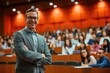 Smiling professor in sharp suit poses joyfully amidst a lecture hall, connecting with students in the background. Generated AI