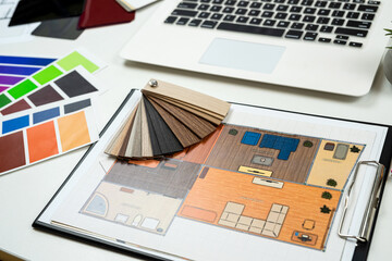 Wall Mural - Architectural materials blueprints laptop tools and color sampler for renovation