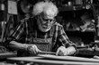 © standret - Mature man Master carpenter in his workshop