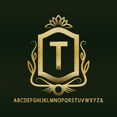 Poster - Golden vintage monogram and set of capital letters with minted decor. Gold letter framed in shield with elegant ornament.