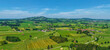 Das Auerbergland im Sommer von oben, Blick über die ländliche Region zum Auerberg
