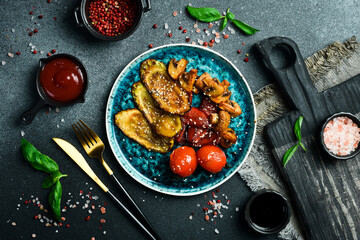 Wall Mural - A plate of grilled vegetables: mushrooms, zucchini, tomatoes and paprika. Barbecue menu. On a dark background, close-up.
