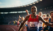 © ink drop - A male track and field athlete celebrating winning a sprint race at a sports event