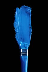 Aufkleber - Blue paintbrush against a black background. Suitable for artistic projects or creative concepts