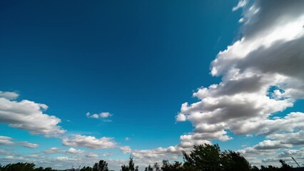 Canvas Print - flying White Clouds on the summer sky Time laps