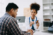 © Nuttapong punna - Doctors explain the use of medication to patients. healthcare and medical concept.