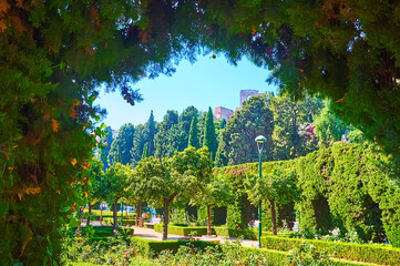 Sticker - Gardens of Pedro Luis Alonso through the thuja arch, Malaga, Spain