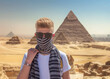Pyramids of Giza, Egypt. A portrait of teenager tourist