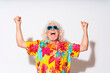 © VISTA by Westend61 - Cheerful senior man cheering against white background