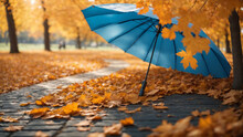 Beautiful Autumn Background Landscape. Carpet Of Fallen Orange Autumn Leaves In Park And Blue Umbrella. Leaves Fly In Wind In Sunlight. Concept Of Golden Autumn Ai Image 