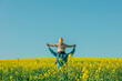 © VISTA by Westend61 - Father carrying son on shoulder in rapeseed field