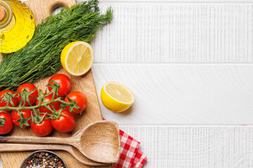 Poster - Cooking scene: Cherry tomatoes, herbs and spices on table