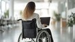 © visoot - Close-up Businesswoman on the wheelchair working on the laptop in the modern white office. Generative AI.