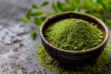 Green tea matcha close-up. Dry green tea. Macro of a match. Powder, match tea. Bamboo Matcha Tea Whisk also know as chasen. japan green match tea