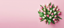 A Bunch Of Tulips Isolated Against A Pink Background.
