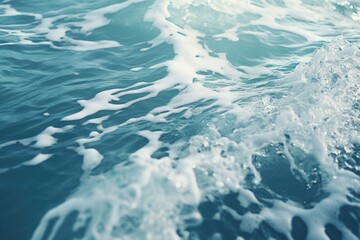 Poster - A close-up view of a wave in the ocean. This image captures the power and beauty of the ocean. Perfect for any project related to nature, water, or the beach
