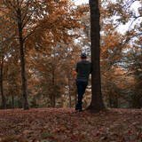 Fototapeta Konie - man trekking in the mountain in autumn season