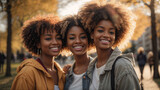 Fototapeta Fototapeta Londyn - Multiracial female friends taking selfie with smart mobile phone outside in a park, Happy young people smiling at camera on city street, Youth community concept with women hanging out on sunny day
