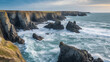 A rugged coastline with crashing waves and jagged cliffs.