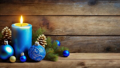 Wall Mural - christmas burning blue candle and christmas decorations on wooden background christmas day horizontal greeting and invatation banner with copy space for advertisement and other usage