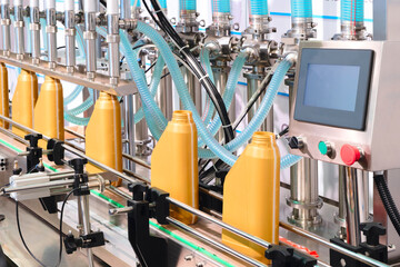 Poster - Production line on a conveyor for filling plastic cans and bottles