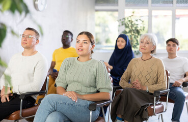 Canvas Print - Portrait of students of different years and of different nationalities on training session in lecture hall