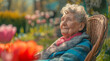 Happy elderly lady in her garden  with copy space