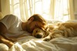 A young male person and their golden retriever enjoying a peaceful sleep together in a sunlit bedroom