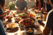 © Creative - Diverse People Dining Together Concept. Top view of diverse group of friends having dinner together at home.