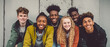 Multiethnic friendship and people concept. Diverse teens hugging and having fun