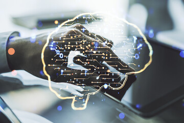 Poster - Double exposure of creative human brain microcircuit and hand working with a digital tablet on background. Future technology and AI concept