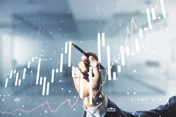 Poster - Multi exposure of man hand with pen working with abstract virtual financial graph on blurred office background, forex and investment concept
