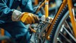 Woman repairman in rubber gloves repairing bike with tools closeup 