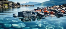 Black Lava Rocks On The Surface Of Calm Water, Yoga Concept