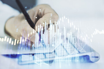 Poster - Abstract creative financial graph with hand writing in diary on background, financial and trading concept. Multiexposure