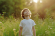 © Varitnan - a child takes deep breath fresh air in the field of meadow and forest, nature and environment concept, generative Ai
