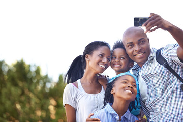 Happy black family, selfie and photography in nature for hiking, bonding or outdoor photo together. African mother, children and father smile taking picture or photograph for adventure in forest