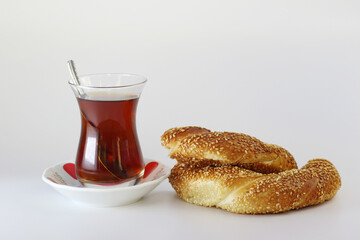 Wall Mural - turkish tea and bagels on white background